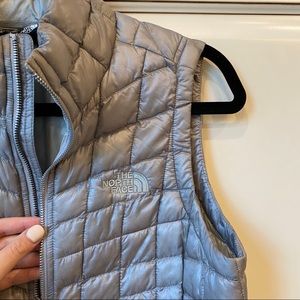 Gray north face vest. With thermoball